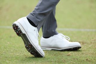 Tiger Woods' white FootJoy shoes seen