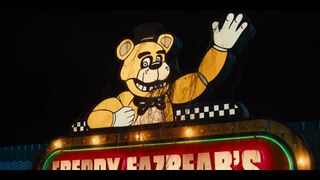 The illuminated sign for Freddy Fazbear's restaurant, in the Five Nights at Freddy's movie.