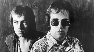 LONDON - CIRCA 1971: Pop singer Elton John and his lyricist Bernie Taupin (left) pose for a portrait in circa 1971 in London, England. (Photo by Michael Ochs Archives/Getty Images)