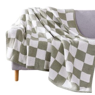 A checkered throw on a sofa
