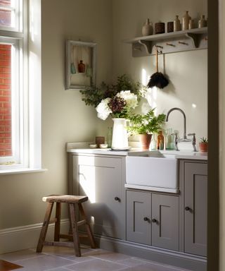 sink area in a boot room with shaker style units