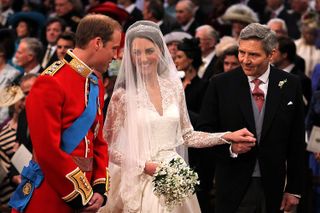 Prince William and Kate Middleton with he father Michael at their wedding