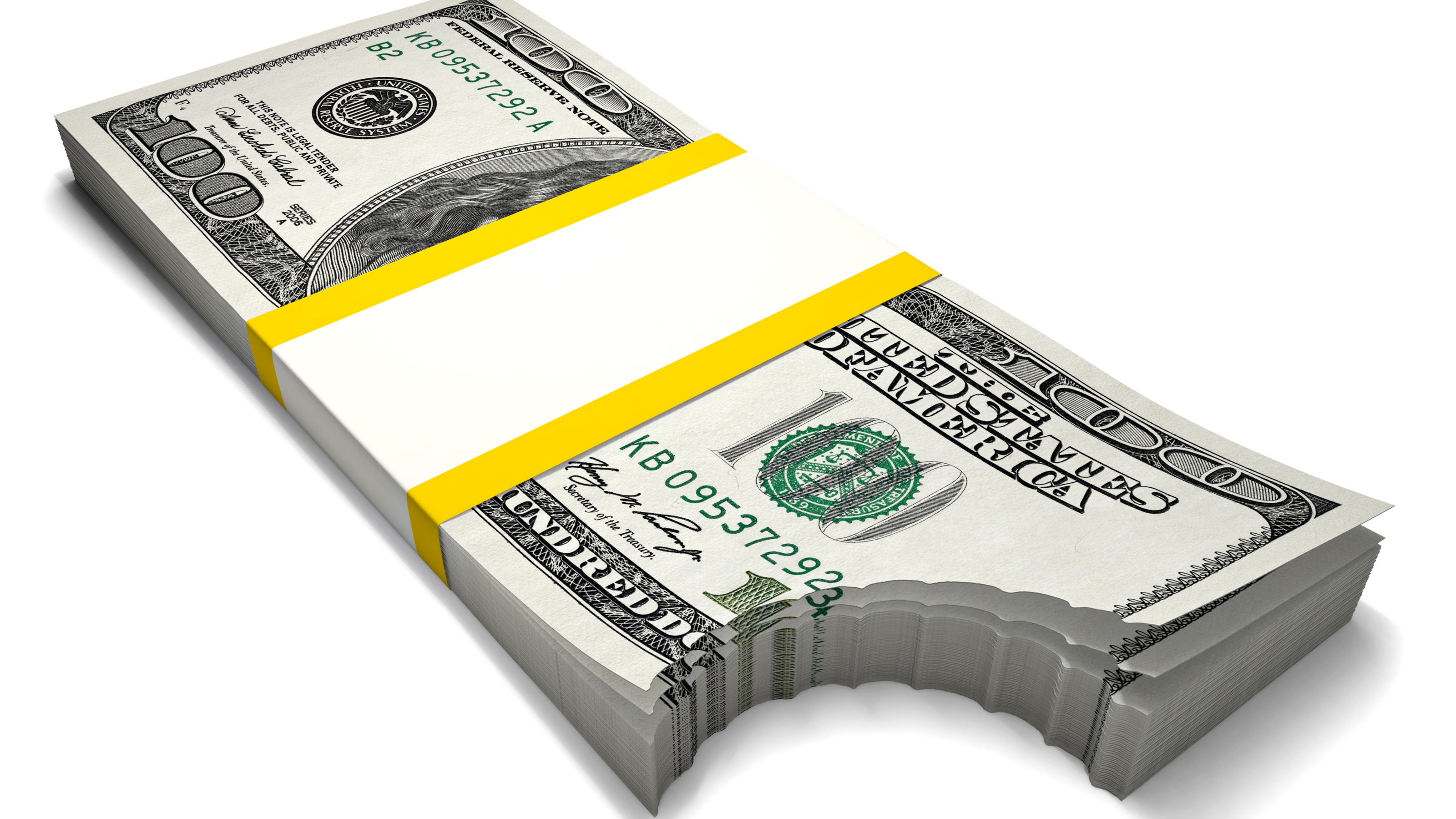 A stack of hundred-dollar bills with a bite taken out of it.