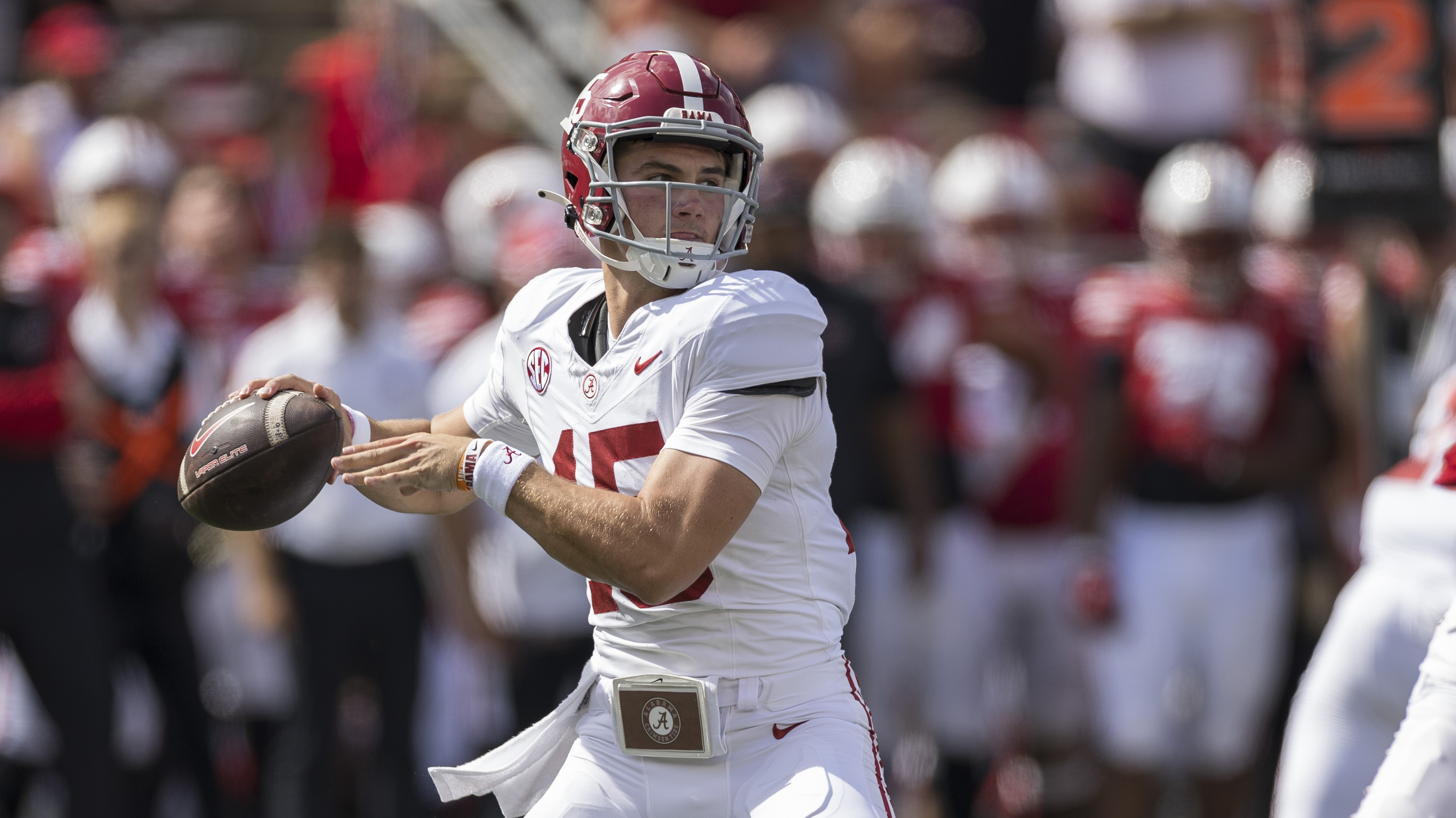 Alabama Crimson Tide quarterback Ty Simpson (15) drops back to throw a pass durning a college football game between the Alabama Crimson Tide and the Wisconsin Badgers on September 14th, 2024 at Barry Alvarez field inside Camp Randall Stadium in Madison, WI.