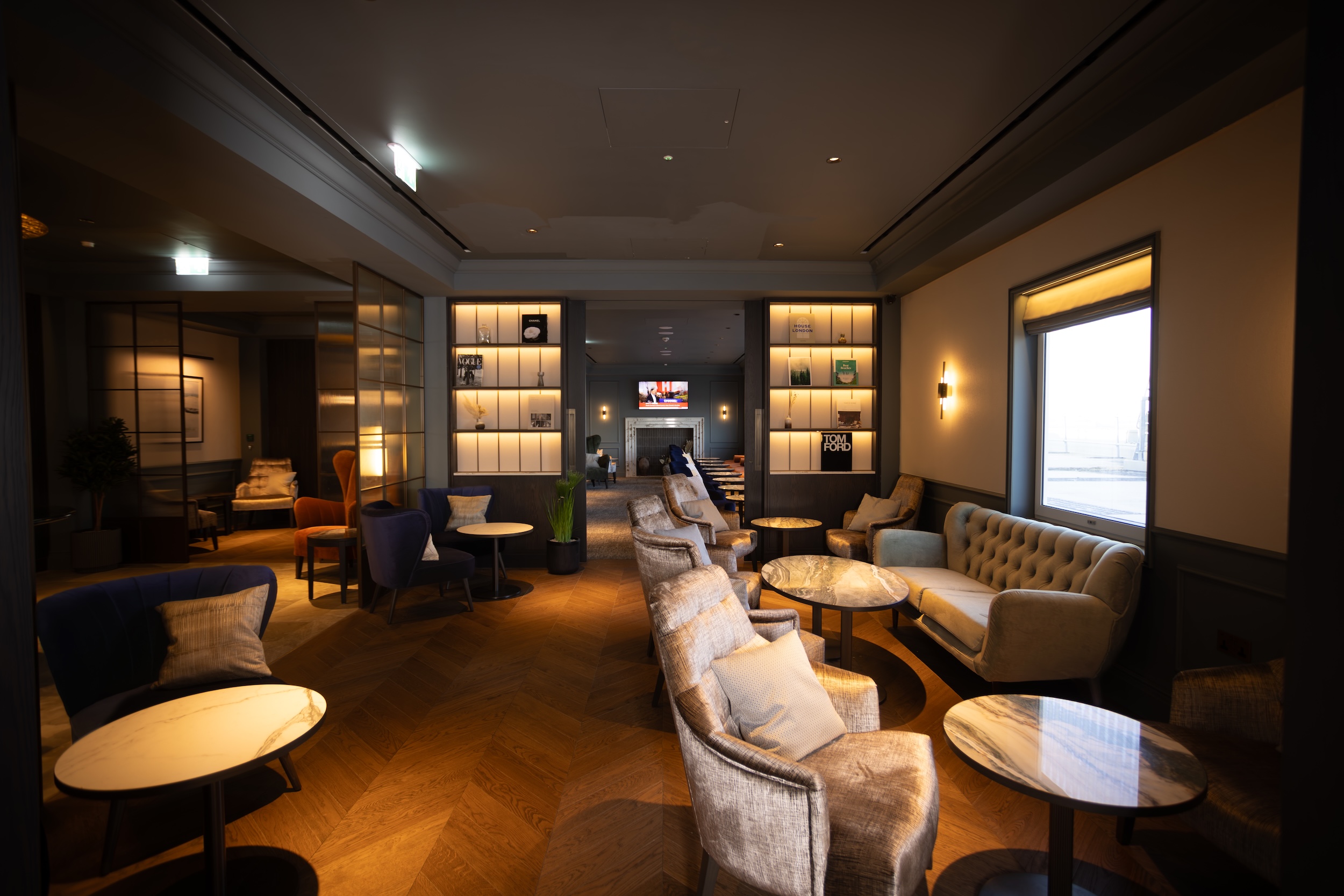 Photos of seating areas in the airport lounge Clubrooms at Heathrow Terminal 3