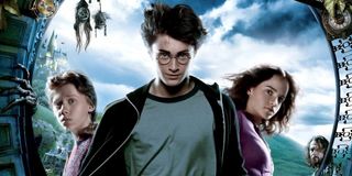 Harry Potter and the Prisoner of Azkaban Ron, Harry, and Hermione lined up for the poster, with Sirius in the background