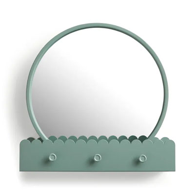 green circular mirror with storage