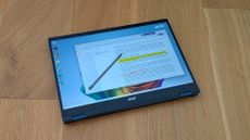 The Acer Swift Spin 14 AI on a desk