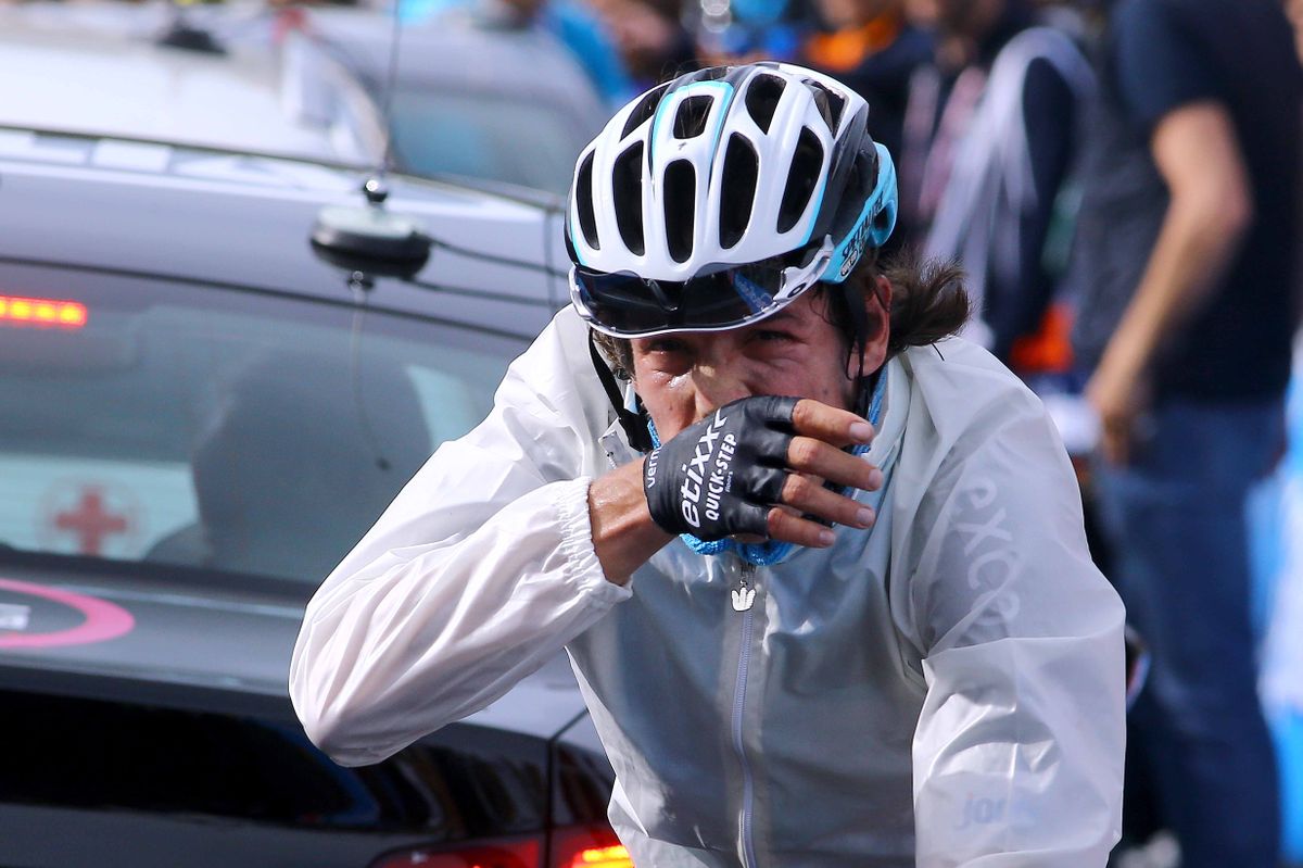 Rigoberto Uran (Etixx-Quick Step) rugged up after the stage