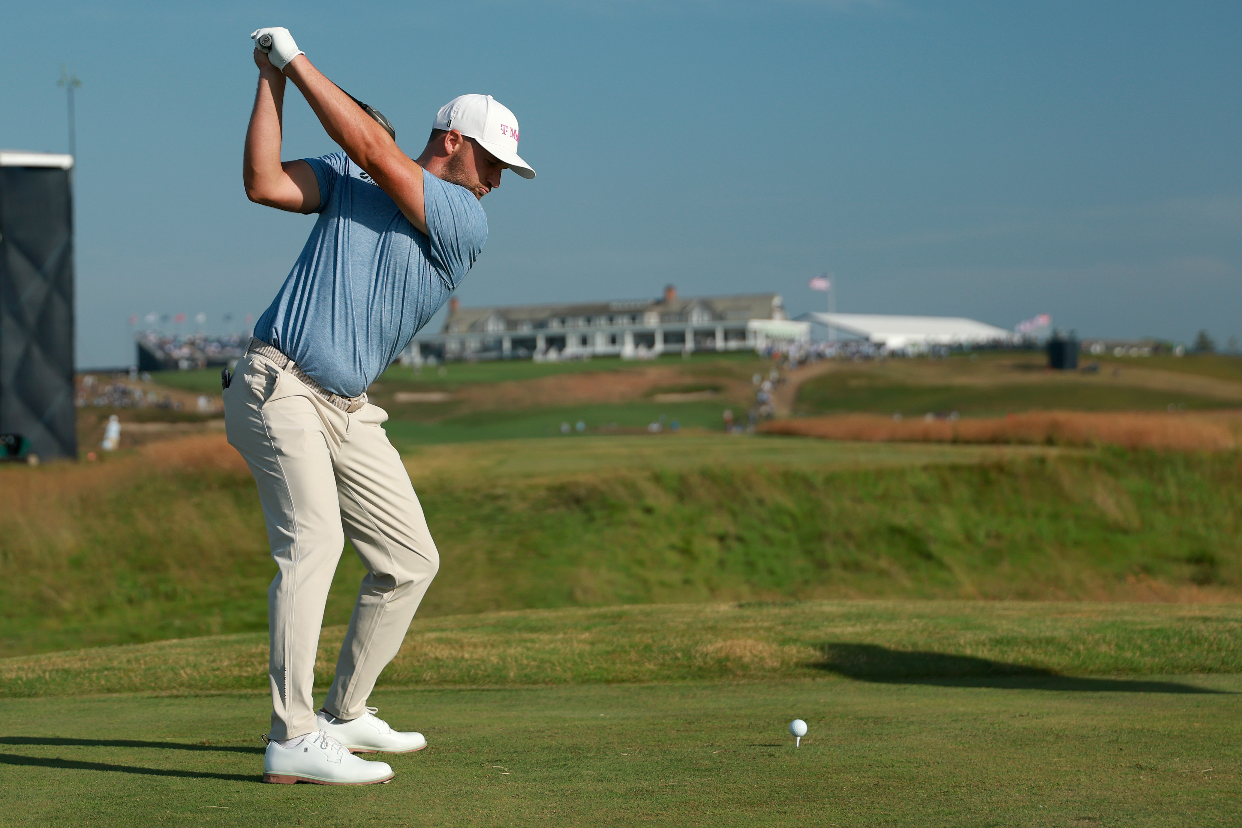 Wyndham Clark of the United States plays a shot from the 18th tee during the first round of the 126th U.S. OPEN at Shinnecock Hills Golf Club