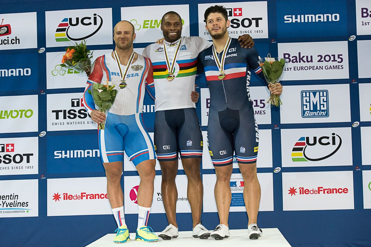 Gr&eacute;gory Baug&eacute; on the top step of the men's sprint podium for his third world title in the event
