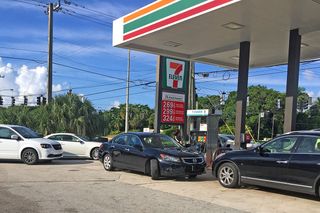 Drivers line up at a 7/Eleven to buy gas in Delray Beach, Florida, on Sept. 5, 2017. Residents were preparing early for Hurricane Irma, which is expected to hit the Florida Keys and parts of the Florida peninsula.