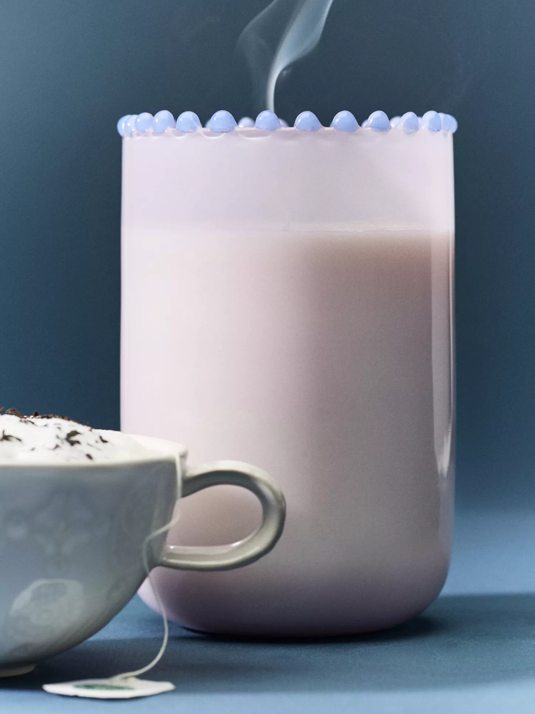 A dotted rim earl gray tea scented candle from Anthropologie