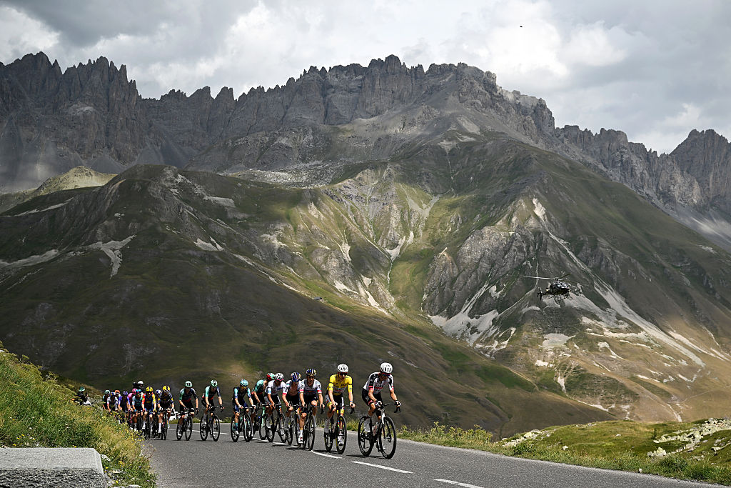 A general view of Tadej Pogacar of Slovenia - Yellow Leader Jersey Isaac Del Toro of Mexico and UAE Team Emirates - XRG - White best Young Rider Jersey, Quinn Simmons of United States and Team Lidl - Trek, Tom Pidcock of Great Britain and Team Pinarello Q36.5 Pro Cycling and the peloton compete climbing to the Col du Galibier (2642m) during the 113th Tour de France 2026, Stage 20 a 170.9km stage from Le Bourg d'Oisans to Alpe d'Huez 1842m / #UCIWT / on July 25, 2026 in Alpe d'Huez, France. (Photo by Dario Belingheri/Getty Images)