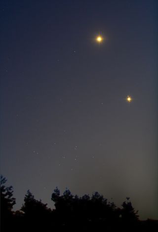 Chris Schur captured this image of Jupiter, Venus and the M44 star cluster in the night sky on Aug. 18, 2014.