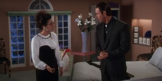 Julia Louis-Dreyfus and Nicholas Guest in National Lampoon's Christmas Vacation
