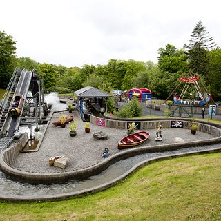 park with water and kids playing area