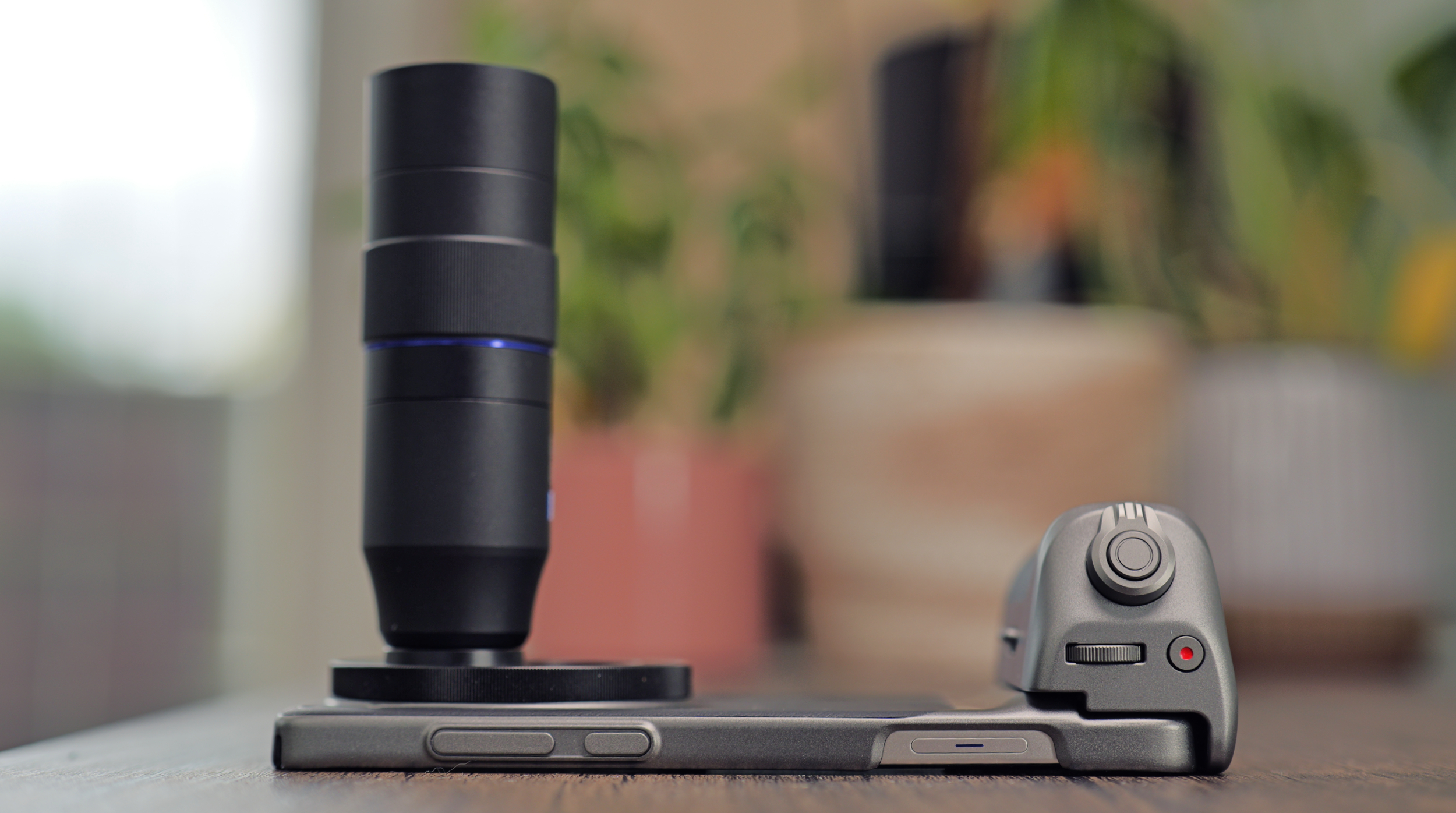 Vivo X200 Ultra phone with telephoto lens and camera kit attached