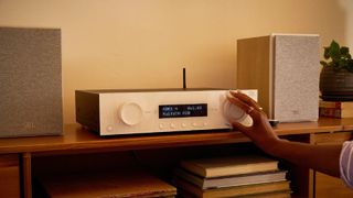 JBL MA AVR on stand in living room