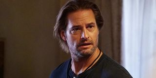 Colony Josh Holloway looking concerned in his living room