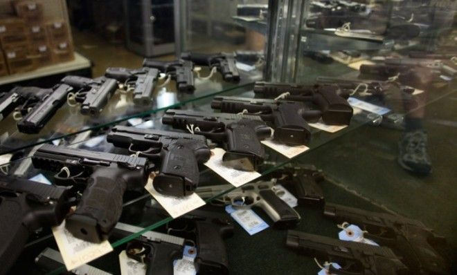 Hand guns seen on display for purchase.