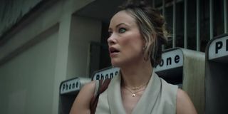 Richard Jewell Olivia Wilde stunned in front of a bank of pay phones