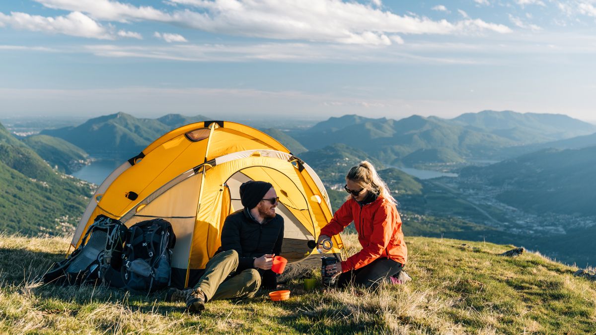 what size tent do I need: two campers outside a tent