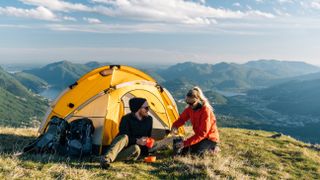 what size tent do I need: two campers outside a tent