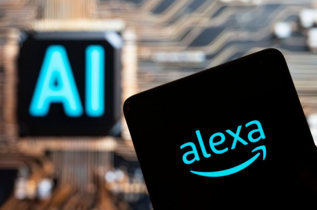 Amazon&#039;s Alexa logo on smartphone with teal AI letters blurred in background