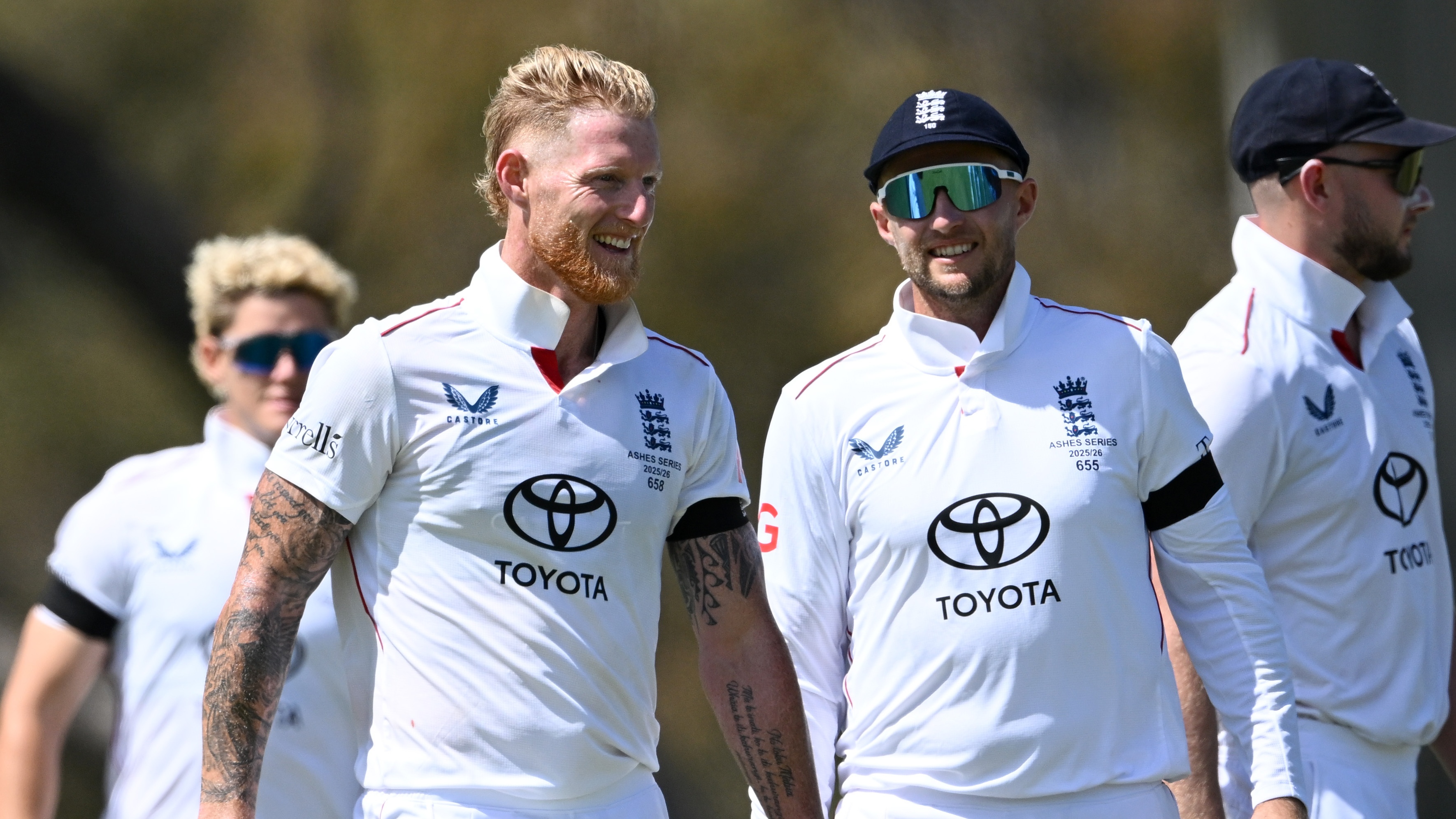 England captain Ben Stokes celebrates with Joe Root after dismissing Rehan Ahmed of England Lions during the practice match between England and the Lions at Lilac Hill on November 13, 2025 in Perth, Australia. 
