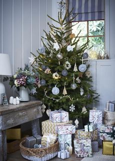 christmas tree surrounded with gifts 