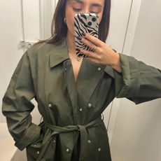 Senior Shopping Editor Marina wearing khaki trench coat