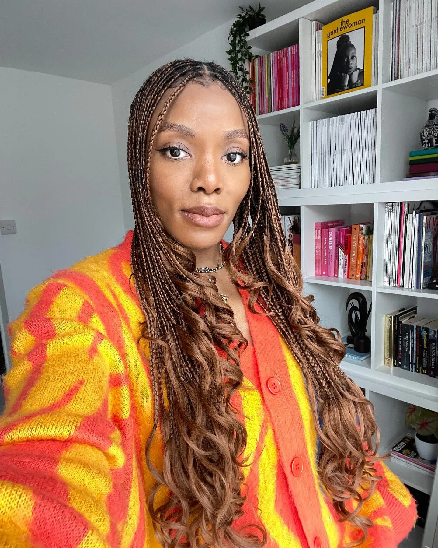 @the_oluwaseun with a copper brunette hair colour