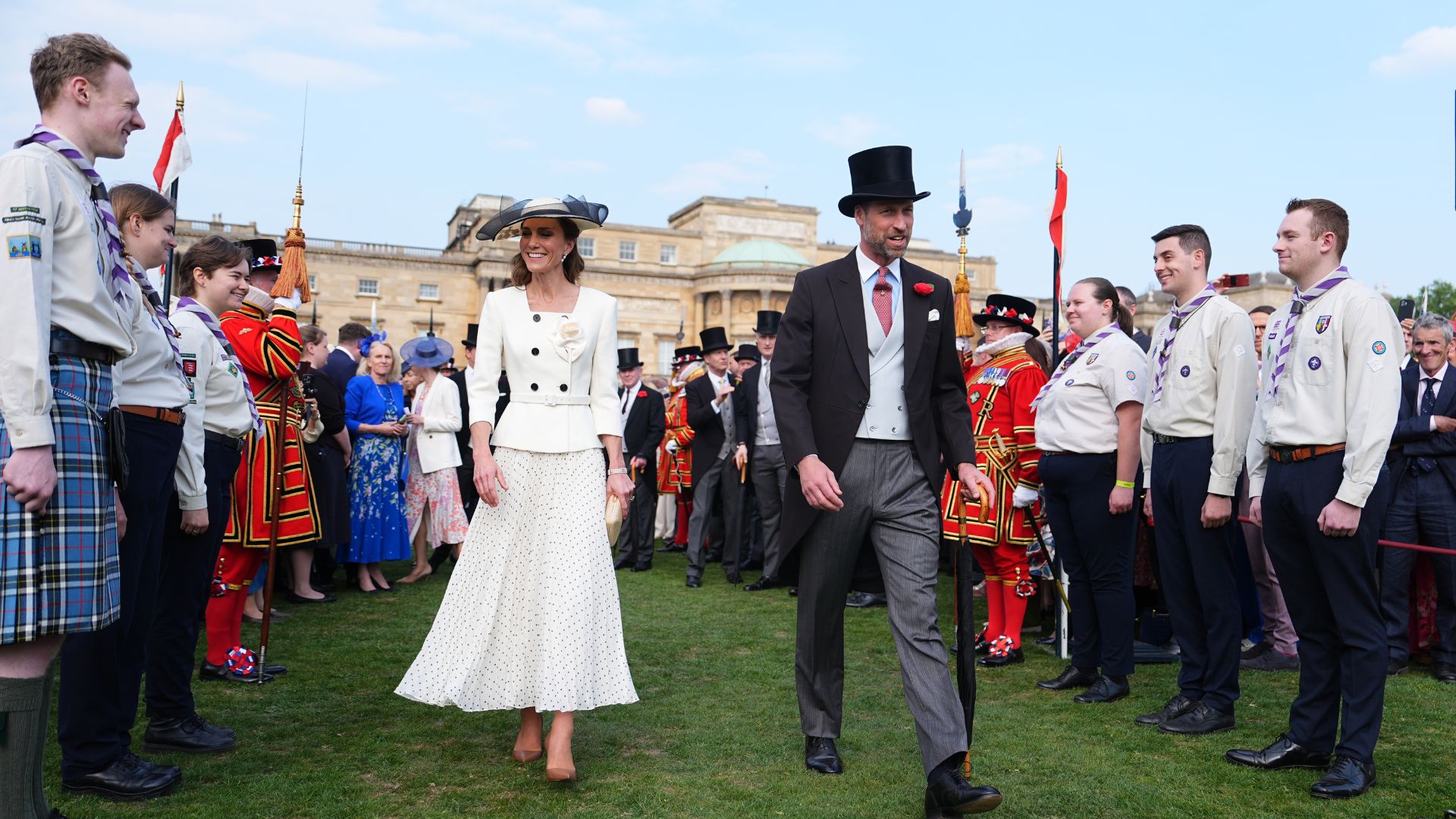 Kate Middleton and Prince William greet guests during a Royal Garden Party at Buckingham Palace on May 8, 2026
