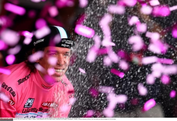 Rigoberto Uran (Omega Pharma-Quick Step) spraying the champangne
