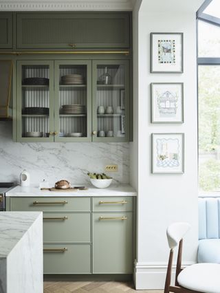 Green kitchen designed by Irene Gunter