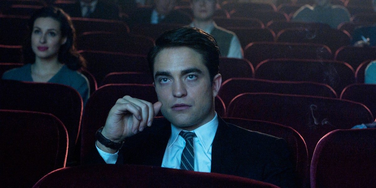 Robert Pattinson in a movie theater