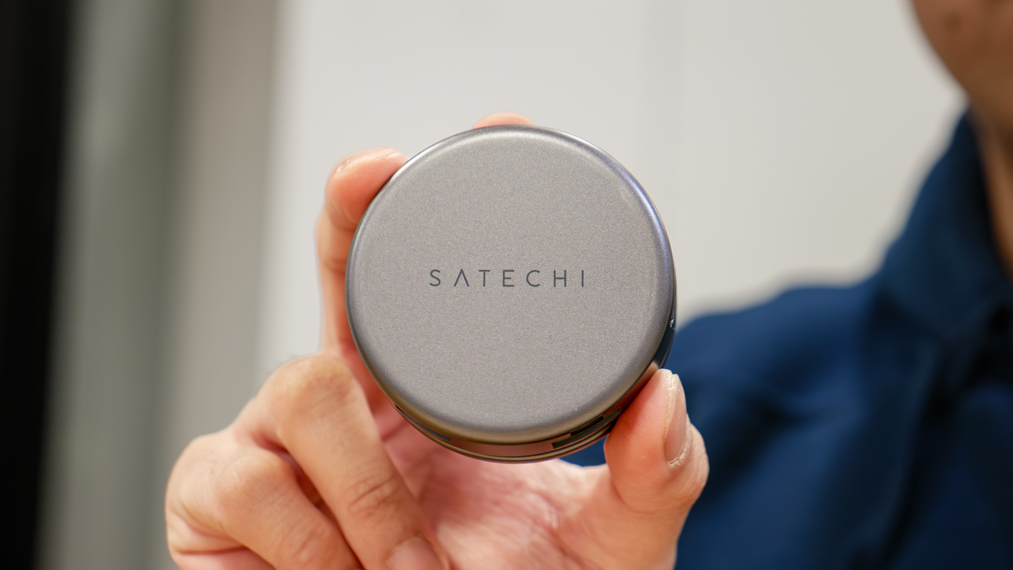 Satechi OntheGo 7-in-1 Multiport Adapter held in the hand.