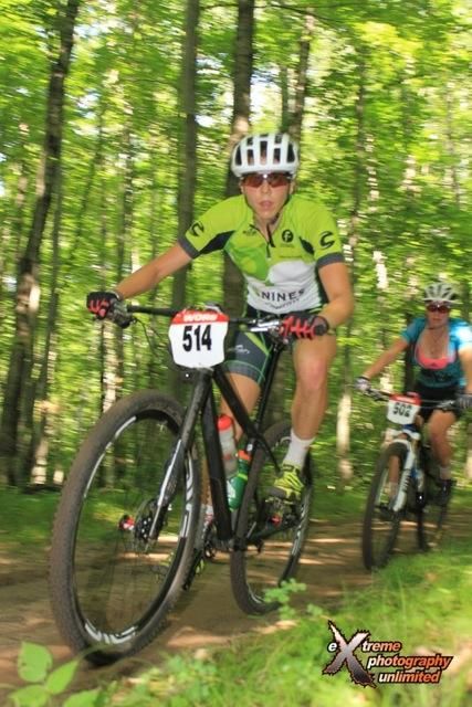 Amber Markey (5 Nines/ Motorless Motion) tries to shake off Cooper Dendel (Quick Stop Bike Shop)