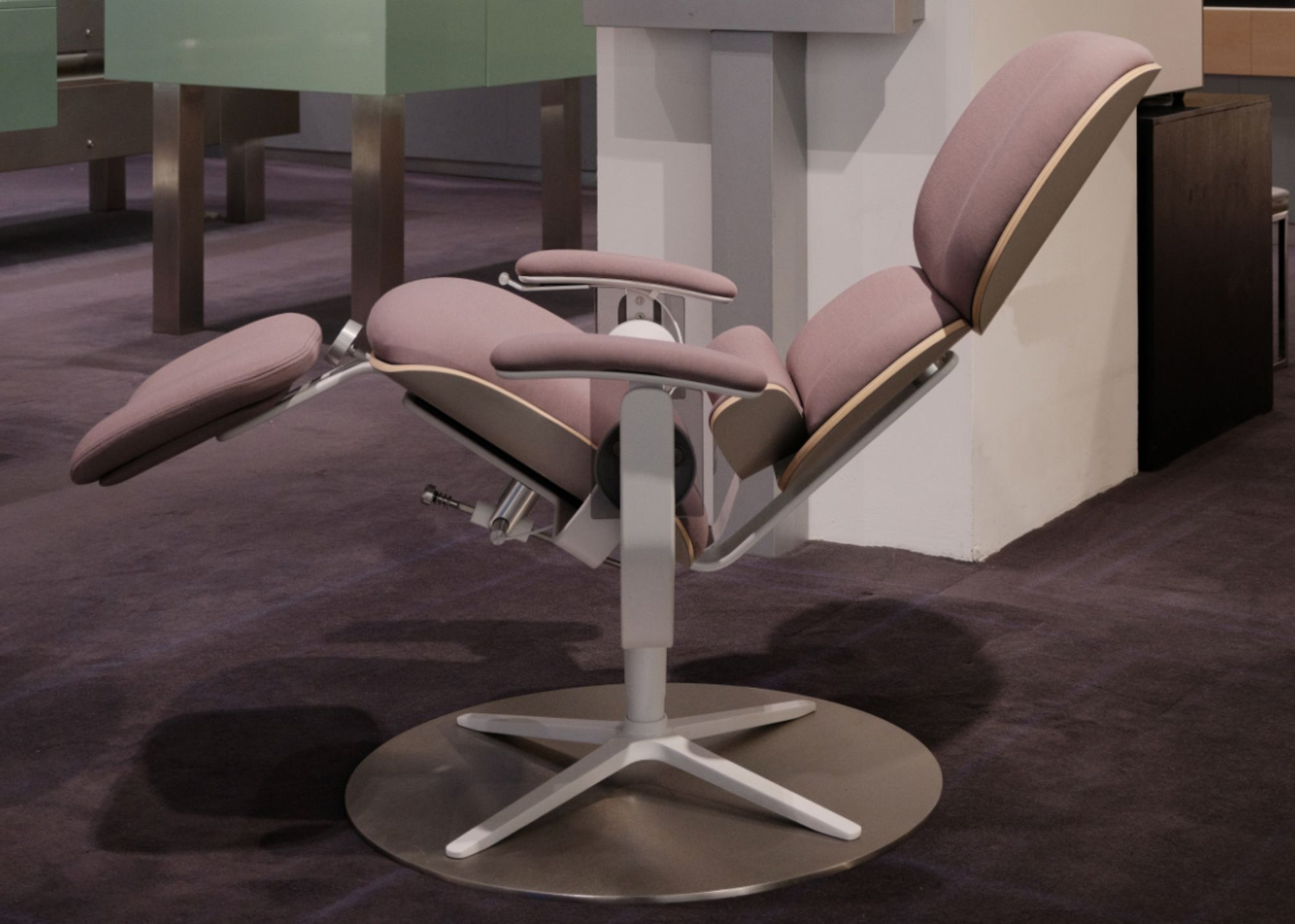 A light plum chair on a steel base