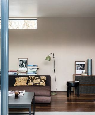 Living room with retro furniture painted in Farrow & Ball Jitney