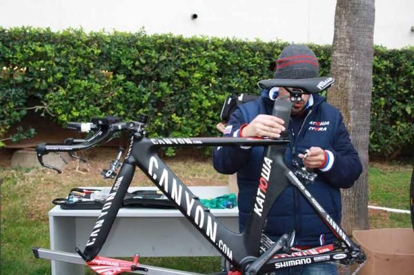 A Katusha mechanic gets to work on a Canyon time trial bike