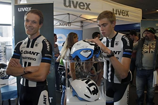 Riders sign kit and products for the fans