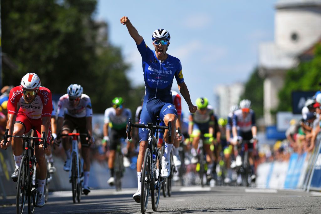 BOURGENBRESSE FRANCE JULY 29 Jannik Steimle of Germany and Team Deceuninck QuickStep celebrates at finish line during the 33rd Tour de lAin 2021 Stage 1 a 1391km stage from Parc des Oiseaux to BourgenBresse 237m tourdelain on July 29 2021 in BourgenBresse France Photo by Luc ClaessenGetty Images