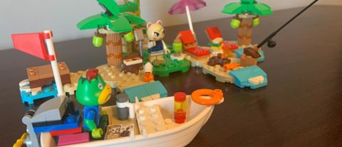 Lego Kapp'n's Island Boat Tour set laid out on a wooden table