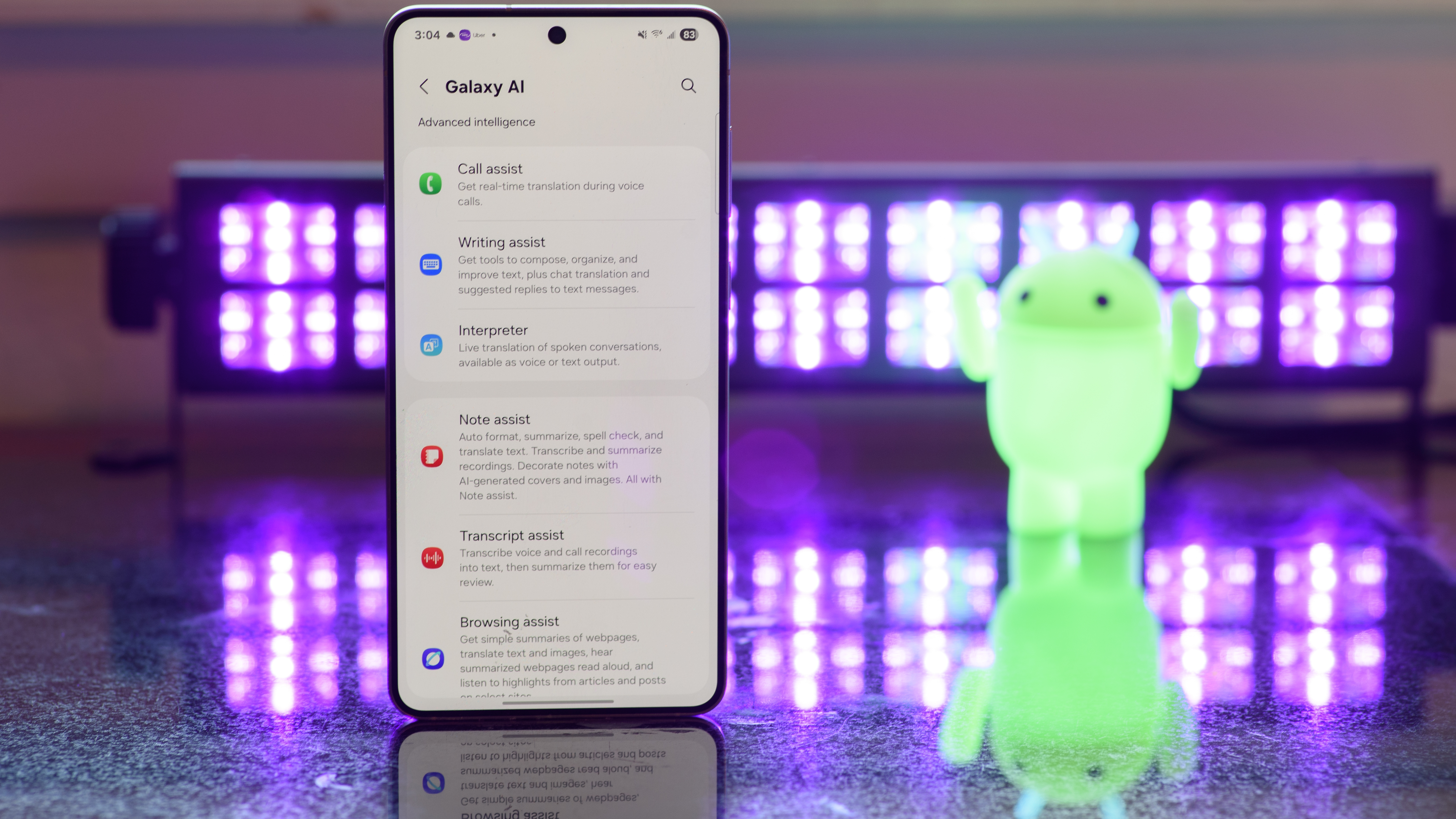 Samsung Galaxy S25 Edge showing the Galaxy AI settings with black lights and an Android figurine blurred in the background