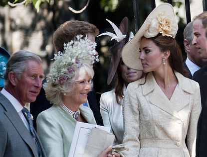 Kate Middleton, Prince Charles and Camilla Duchess Of Cornwall at Zara Phillips and Mark Tindalls Wedding