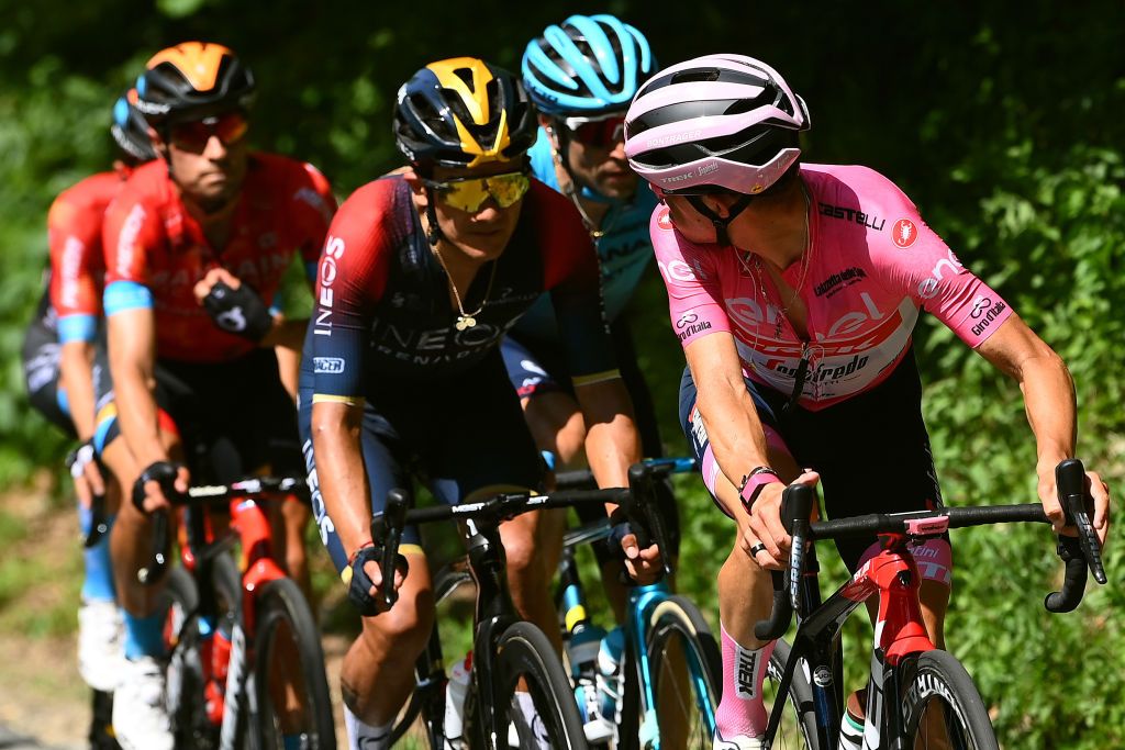 TURIN ITALY MAY 21 LR Richard Carapaz of Ecuador and Team INEOS Grenadiers and Juan Pedro Lpez of Spain and Team Trek Segafredo Pink Leader Jersey compete during the 105th Giro dItalia 2022 Stage 14 a 147km stage from Santena to Torino Giro WorldTour on May 21 2022 in Turin Italy Photo by Tim de WaeleGetty Images
