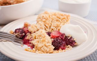 Home baked blackberry and apple crumble with a dollop of Greek yoghurt. Making the most of juicy autumn fruits.