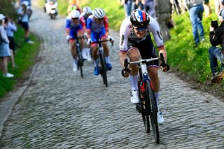 HARELBEKE BELGIUM MARCH 25 Matej Mohoric of Slovenia and Team Bahrain Victorious competes through Oude Kwaremont cobblestones sector during the 65th E3 Saxo Bank Classic 2022 a 2039km one day race from Harelbeke to Harelbeke E3SaxobankClassic WorldTour on March 25 2022 in Harelbeke Belgium Photo by Nico Vereecken PoolGetty Images